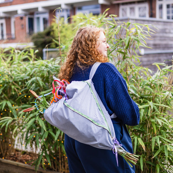 Sustainable flower bag for cycling, made from leftover and secondhand fabrics