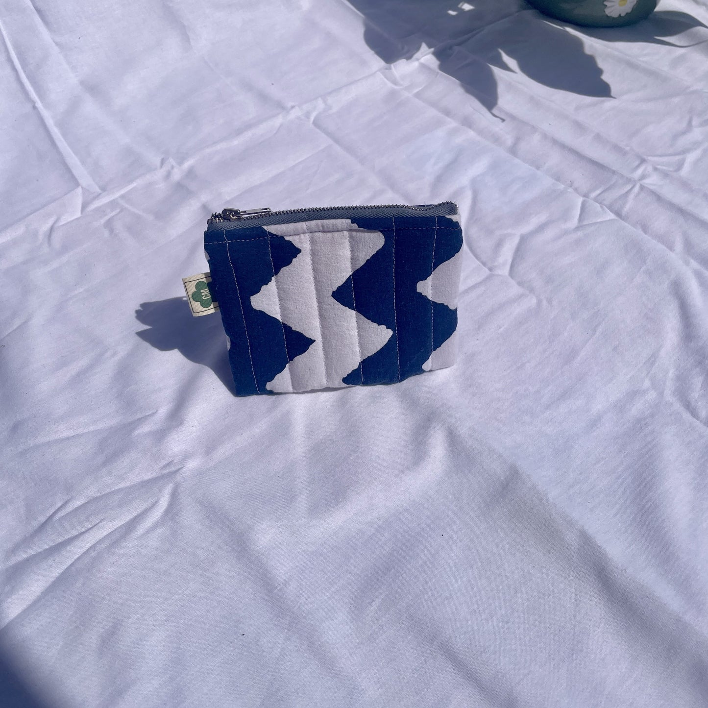 Flat zip pouch for small essentials, made from sustainable fabrics