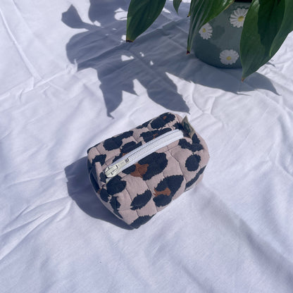 Small handmade toiletry bag made from upcycled and secondhand fabrics